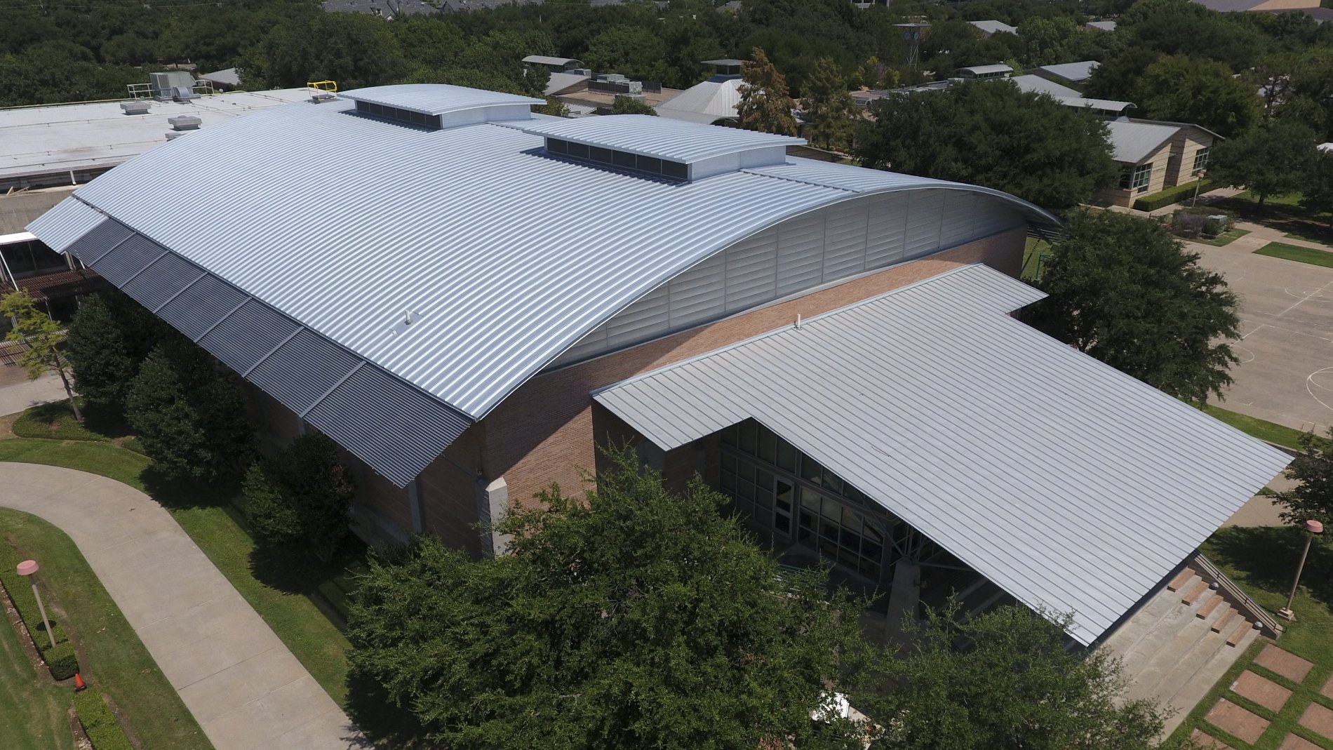 Leaking School Roof Problem Solved with Symmetrical Standing Seam Roofing System